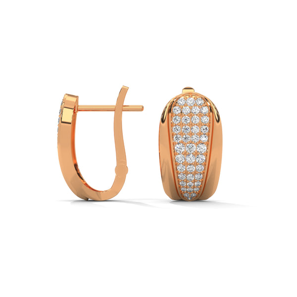 Bold yet graceful, these yellow gold huggie earrings feature a stunning tapered pavé diamond pattern for a refined sparkle.