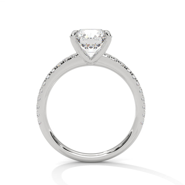 “Celeste Ring—round-cut diamond brilliance, delicate pavé sparkle, and classic white-gold elegance crafted to symbolize timeless beauty, modern romance, and unforgettable moments.”