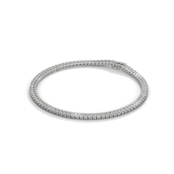 This luxurious tennis bracelet features 51 oval-shaped diamonds, totaling 9.00 carats. With a 7-inch length, it radiates elegance and charm, making it a perfect accessory for any occasion.