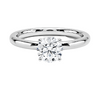 A sleek and modern solitaire ring featuring a round brilliant diamond in a classic four-prong setting atop a refined white gold band.