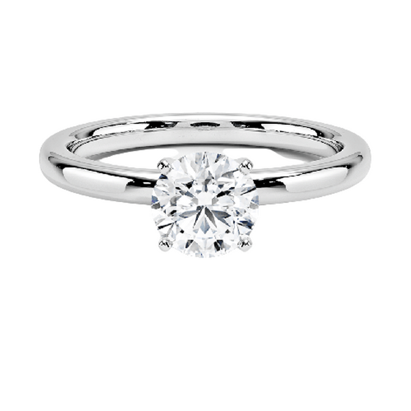 A sleek and modern solitaire ring featuring a round brilliant diamond in a classic four-prong setting atop a refined white gold band.