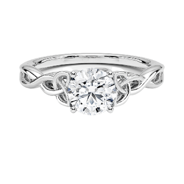 A round brilliant solitaire embraced by an intricate vine-inspired setting, intertwining elegance and organic artistry.