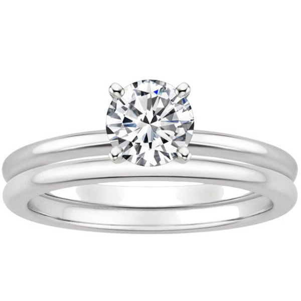 “Timeless solitaire diamond ring set crafted in sleek white gold, offering classic elegance, radiant sparkle, and luxurious brilliance for unforgettable moments.”