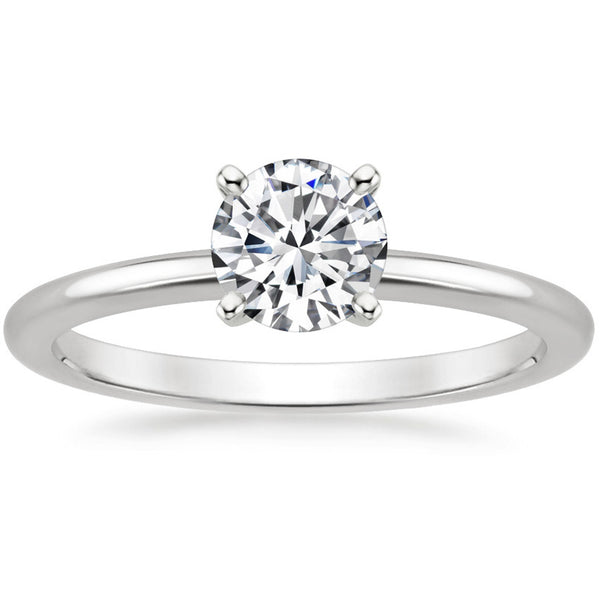 “Timeless solitaire diamond ring set crafted in sleek white gold, offering classic elegance, radiant sparkle, and luxurious brilliance for unforgettable moments.”