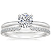 “Elegant diamond engagement ring with shimmering pavé band, crafted in timeless white gold to symbolize love, luxury, brilliance, and lifelong commitment.”
