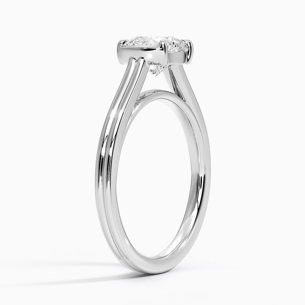 A sleek cathedral-style ring with split shoulders that elegantly lift the diamond in a graceful arc.