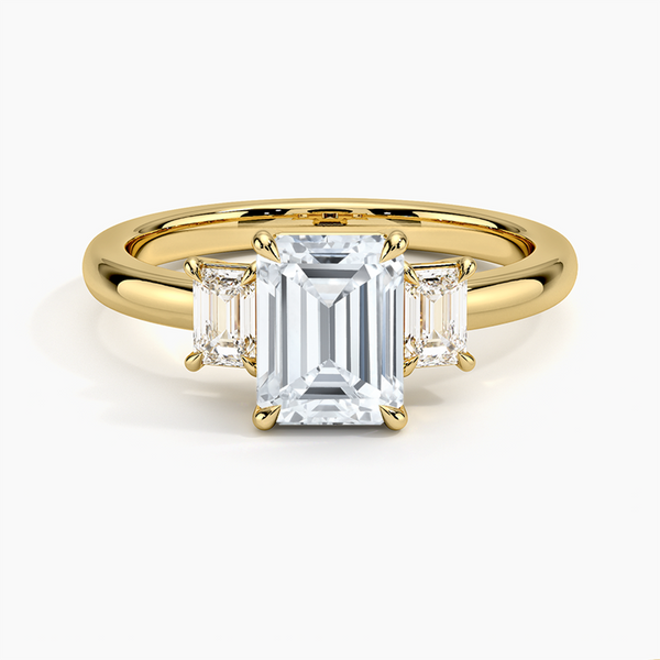 "A timeless emerald-cut diamond ring in radiant yellow gold, crafted for brilliance, luxury, and unforgettable elegance in every moment."