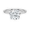 A round brilliant solitaire embraced by an intricate vine-inspired setting, intertwining elegance and organic artistry.
