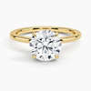 A round brilliant solitaire embraced by an intricate vine-inspired setting, intertwining elegance and organic artistry.