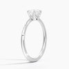 Solenya Whisper is a sleek, minimalist solitaire ring that blends subtle elegance with enduring craftsmanship, letting its brilliant center diamond speak volumes.