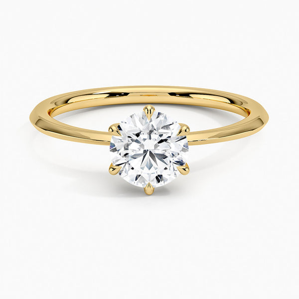 Solenya Whisper is a sleek, minimalist solitaire ring that blends subtle elegance with enduring craftsmanship, letting its brilliant center diamond speak volumes.