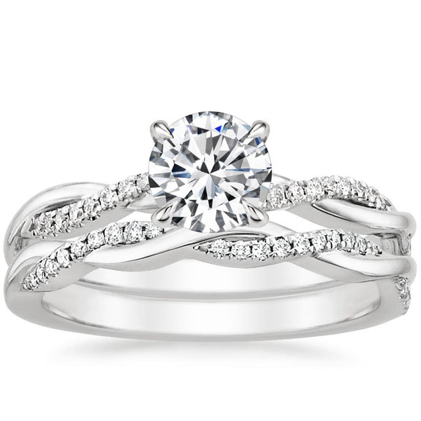 “Celebrate timeless romance with this twisted diamond engagement ring, blending modern brilliance and delicate pavé detailing for unforgettable sparkle and elegance.”