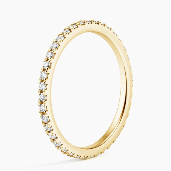 “Elegant diamond eternity band showcasing brilliant sparkle and timeless luxury, crafted for modern brides seeking sophisticated style and lasting beauty.”