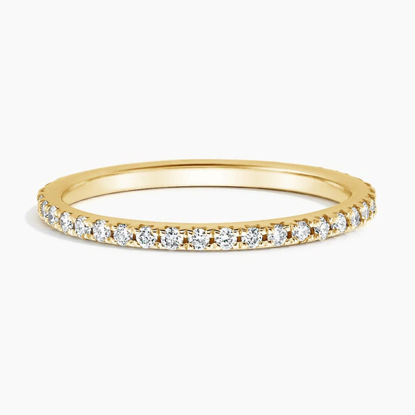 “Elegant diamond eternity band showcasing brilliant sparkle and timeless luxury, crafted for modern brides seeking sophisticated style and lasting beauty.”