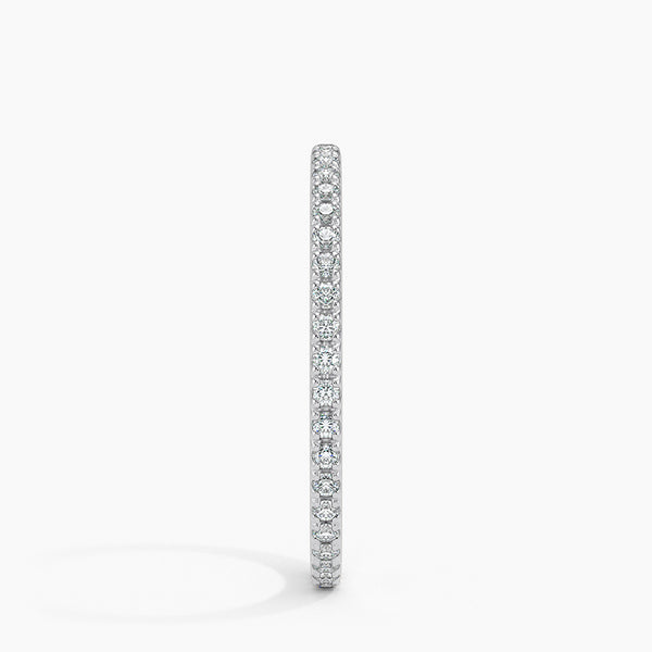 “Timeless diamond eternity band crafted for lasting brilliance, offering a sleek, elegant design perfect for stacking, weddings, and everyday luxury style.”