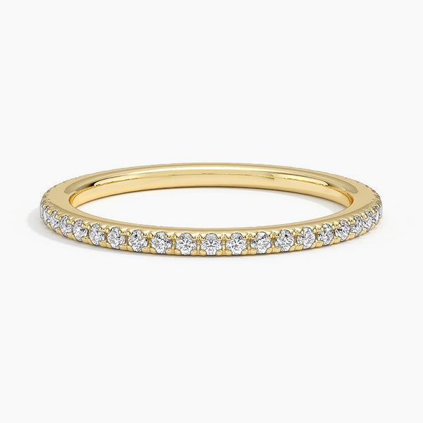 “Timeless diamond eternity band crafted for lasting brilliance, offering a sleek, elegant design perfect for stacking, weddings, and everyday luxury style.”