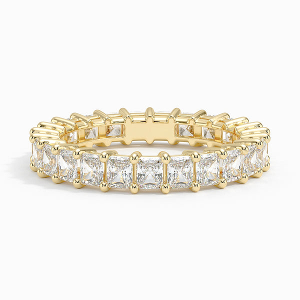 “Luxurious gold princess-cut diamond eternity ring delivering bold brilliance, timeless elegance, and flawless craftsmanship—perfect for weddings, anniversaries, and unforgettable sparkle.”