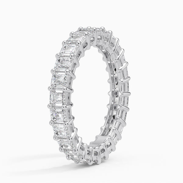 “Celebrate everlasting brilliance with this emerald-cut diamond eternity band, crafted in premium white gold for timeless luxury, sparkle, and sophistication.”