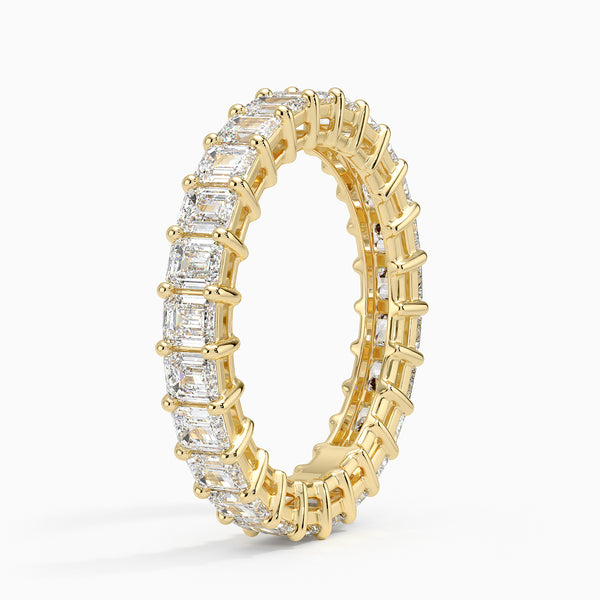 “Celebrate everlasting brilliance with this emerald-cut diamond eternity band, crafted in premium white gold for timeless luxury, sparkle, and sophistication.”