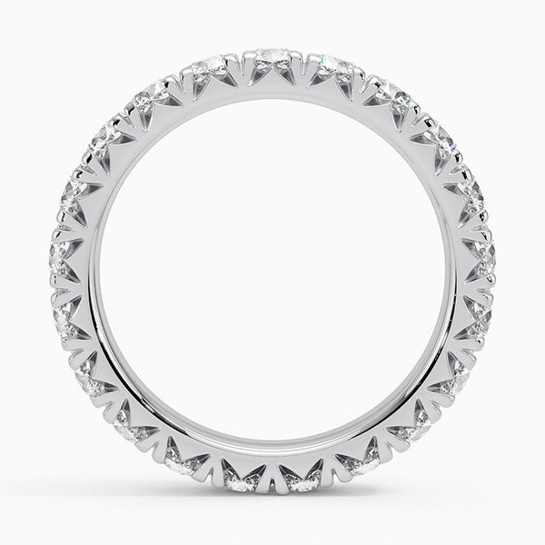 “Round diamond eternity band crafted in luxurious yellow gold, delivering timeless brilliance, bold sparkle, and unmatched elegance for every unforgettable moment.”