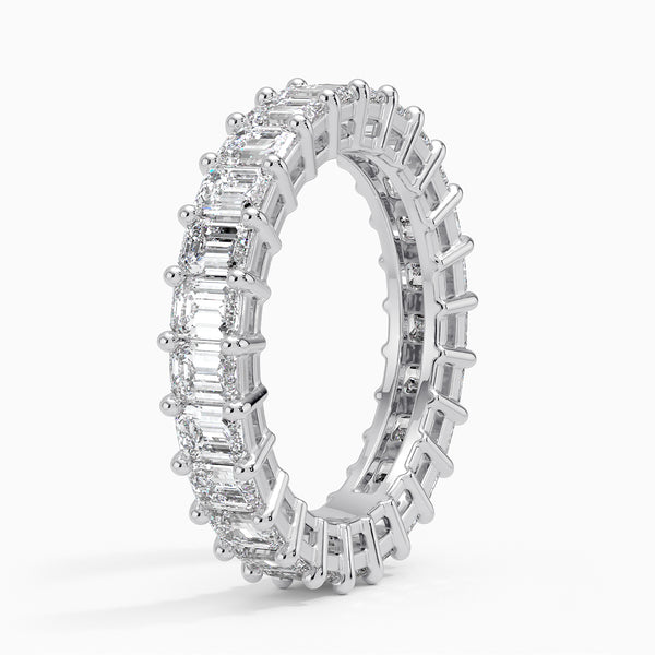 "Experience timeless brilliance with this emerald-cut diamond eternity ring, crafted for unmatched luxury, sparkle, and elegance in every enduring moment."