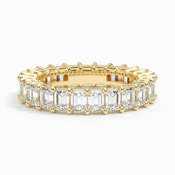 "Experience timeless brilliance with this emerald-cut diamond eternity ring, crafted for unmatched luxury, sparkle, and elegance in every enduring moment."
