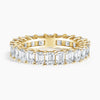 “Luxurious emerald-cut diamond eternity band in radiant yellow gold, delivering bold brilliance, timeless elegance, and unmatched sparkle for unforgettable everyday sophistication.”