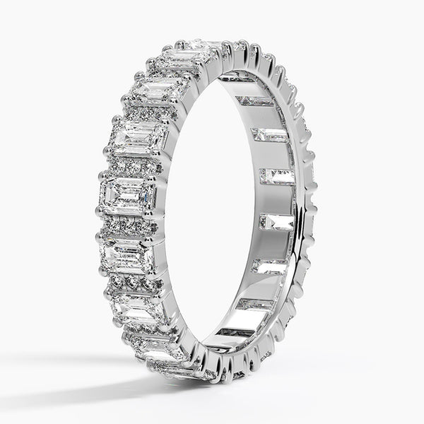 “Radiate timeless luxury with this gold emerald-cut diamond eternity ring, crafted for brilliance, elegance, and unforgettable everyday or bridal style.”