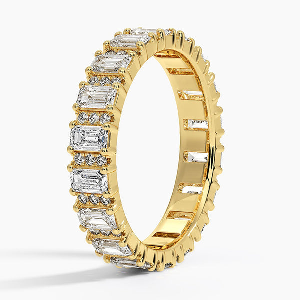 “Radiate timeless luxury with this gold emerald-cut diamond eternity ring, crafted for brilliance, elegance, and unforgettable everyday or bridal style.”