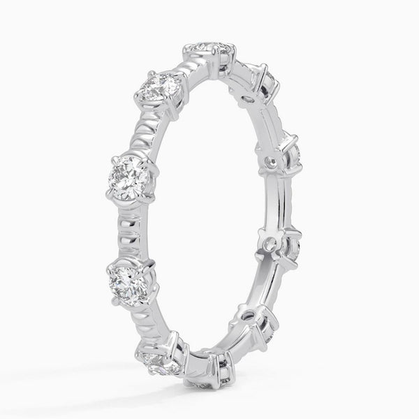 “Brilliant white gold diamond eternity ring offering timeless elegance, superior craftsmanship, radiant sparkle, and luxurious style for weddings, anniversaries, and everyday beauty.”