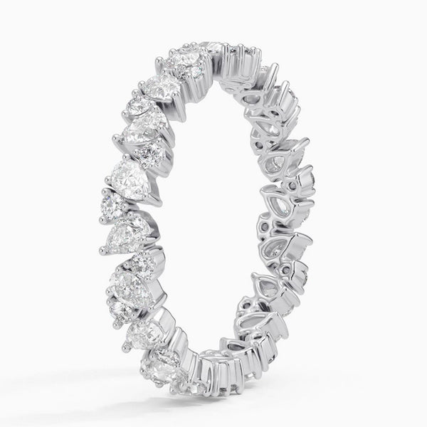 “Celebrate everlasting elegance with this pear-shaped diamond eternity ring, crafted for luxury lovers seeking timeless brilliance, sparkle, and unmatched sophistication.”