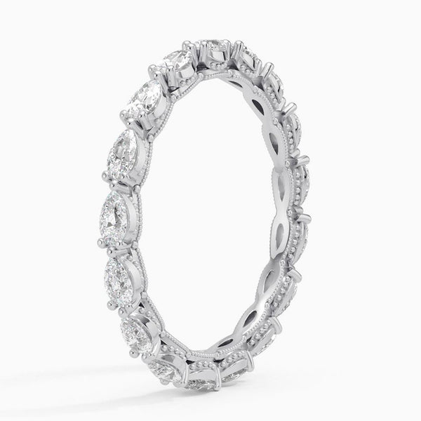 “Elegant pear-shaped diamond eternity ring in yellow gold, crafted for timeless brilliance, luxurious sparkle, and perfect everyday or bridal elegance.”