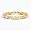 “Elegant pear-shaped diamond eternity ring in yellow gold, crafted for timeless brilliance, luxurious sparkle, and perfect everyday or bridal elegance.”