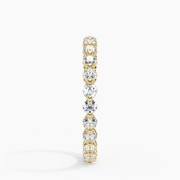 “Elegant diamond eternity ring crafted in shimmering white metal, showcasing brilliant round stones for timeless sparkle, luxury style, and lasting sophistication.”