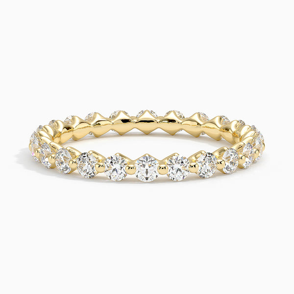 “Elegant diamond eternity ring crafted in shimmering white metal, showcasing brilliant round stones for timeless sparkle, luxury style, and lasting sophistication.”