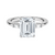 The Solmaris Crest ring showcases a commanding emerald-cut diamond framed by trapezoid side stones, exuding modern elegance and architectural beauty.