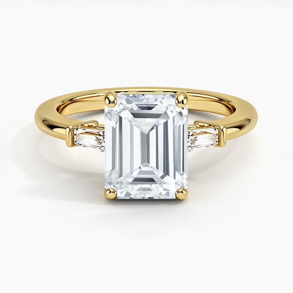 The Solmaris Crest ring showcases a commanding emerald-cut diamond framed by trapezoid side stones, exuding modern elegance and architectural beauty.