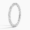 “Elegant diamond eternity band featuring marquise and round stones in sleek white gold, delivering timeless sparkle, refined style, and luxurious brilliance.”