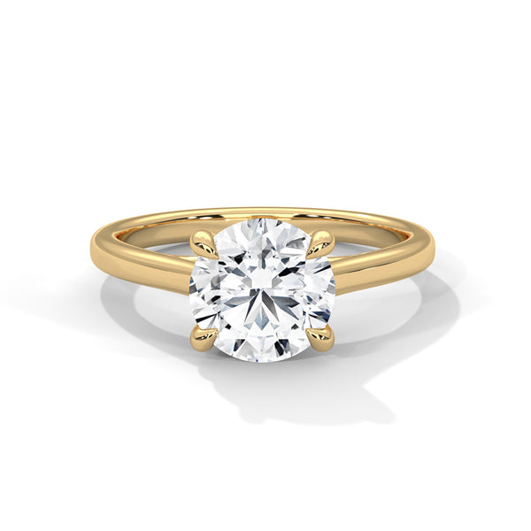 “Aurora Ring—round brilliant diamond sparkle, classic six-prong elegance, and timeless solitaire beauty crafted to symbolize enduring love, refined style, and radiant grace.”