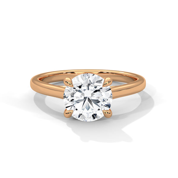 “Aurora Ring—round brilliant diamond sparkle, classic six-prong elegance, and timeless solitaire beauty crafted to symbolize enduring love, refined style, and radiant grace.”