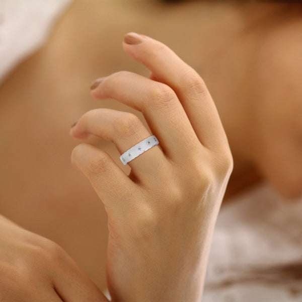 “Elevate everyday elegance with this diamond eternity band, featuring bezel-set brilliance in luxurious gold for timeless sparkle and modern sophistication.”