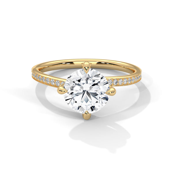 “Celeste Ring—round brilliant diamond beauty, four-prong tulip elegance, and refined pavé sparkle crafted to symbolize timeless love, radiant grace, and everlasting sophistication.”