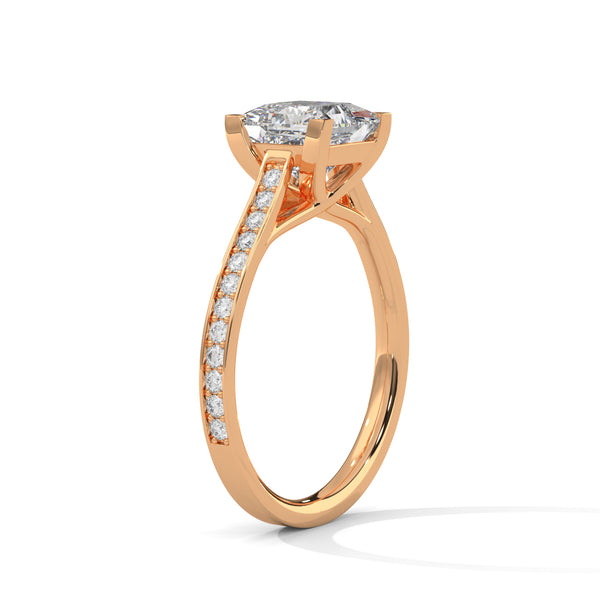“Aria Ring—princess-cut diamond brilliance, sleek four-prong elegance, and pavé-band sparkle crafted to symbolize modern beauty, timeless love, and unforgettable moments.”