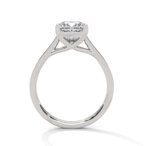 “Aria Ring—princess-cut diamond brilliance, sleek four-prong elegance, and pavé-band sparkle crafted to symbolize modern beauty, timeless love, and unforgettable moments.”