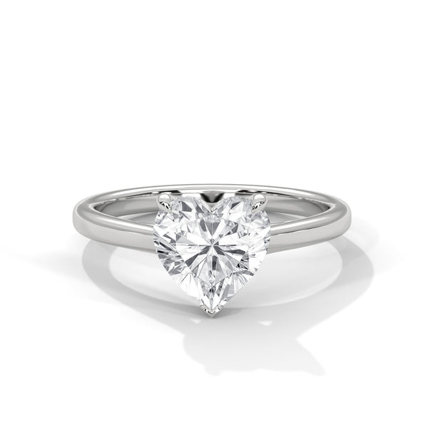 “Amora Ring—heart-shaped diamond brilliance, minimalist solitaire elegance, and modern white-gold beauty crafted to symbolize pure love, timeless romance, and heartfelt moments.”