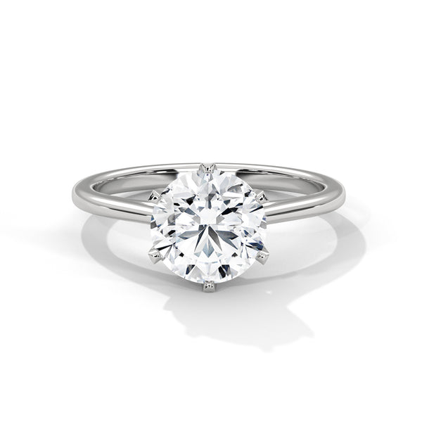 “Nova Ring—round brilliant diamond sparkle, secure six-prong solitaire elegance, and timeless white-gold beauty crafted to symbolize enduring love and radiant sophistication.”