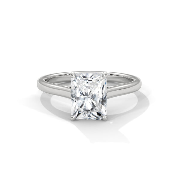 “Nova Ring—radiant-cut diamond brilliance, sleek solitaire elegance, and modern white-gold luxury crafted to symbolize fiery sparkle, timeless beauty, and lasting love.”