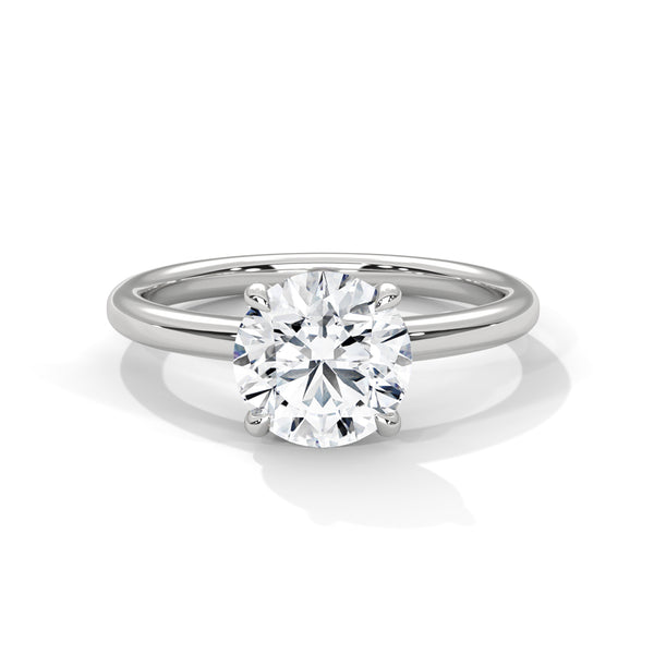“Celeste Ring—round brilliant diamond sparkle, secure six-prong solitaire elegance, and timeless white-gold beauty crafted to symbolize enduring love and classic sophistication.”