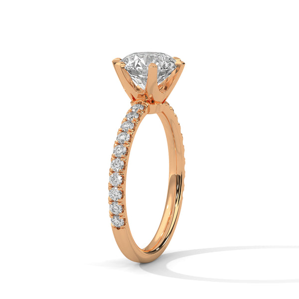 “Celestia Ring—round-cut diamond brilliance, secure six-prong elegance, and pavé-band sparkle crafted to symbolize timeless beauty, lasting love, and radiant sophistication.”