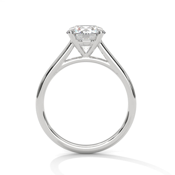 “Celeste Ring—round brilliant diamond sparkle, minimalist four-prong solitaire elegance, and timeless white-gold beauty crafted to symbolize pure love and lasting sophistication.”
